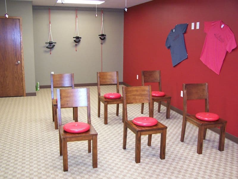 Liberty Chiropractic wobble-chair room with hanging red, white and blue stars